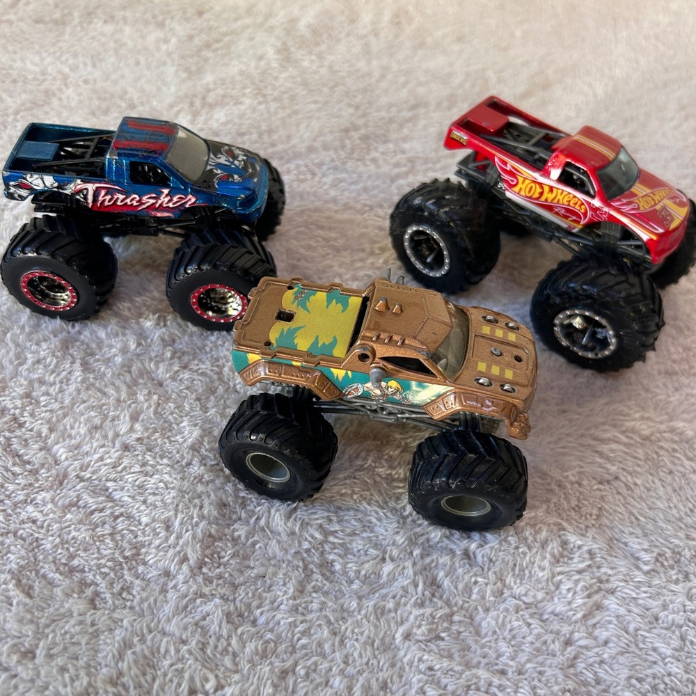 Hot Wheels Monster Jam Trucks Lot of 3 Thrasher He-Man Hot Wheels Racing 1:64